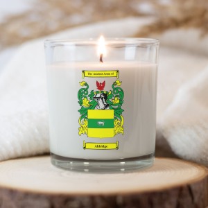 Candle featuring the coat of arms on the glass and the box.